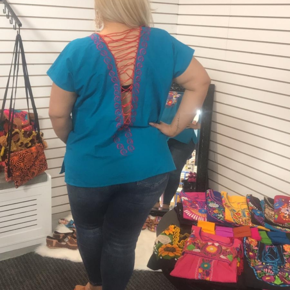 Mexican blouses different sizes and styles.
